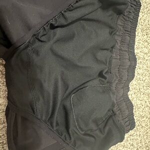 Black Lululemon size 0 , 2.5 inch Hotty Hots